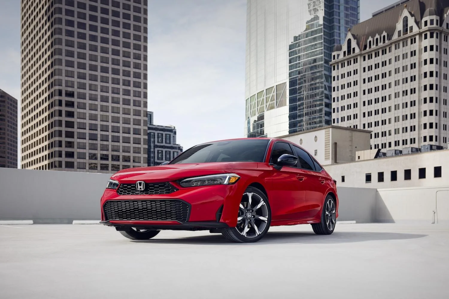 11th Gen Honda Civic 2025 Civic Adds New Hybrid Trims, Sportier Styling and Upgraded Tech 01 2025 Honda Civic Sedan Sport Touring Hybrid