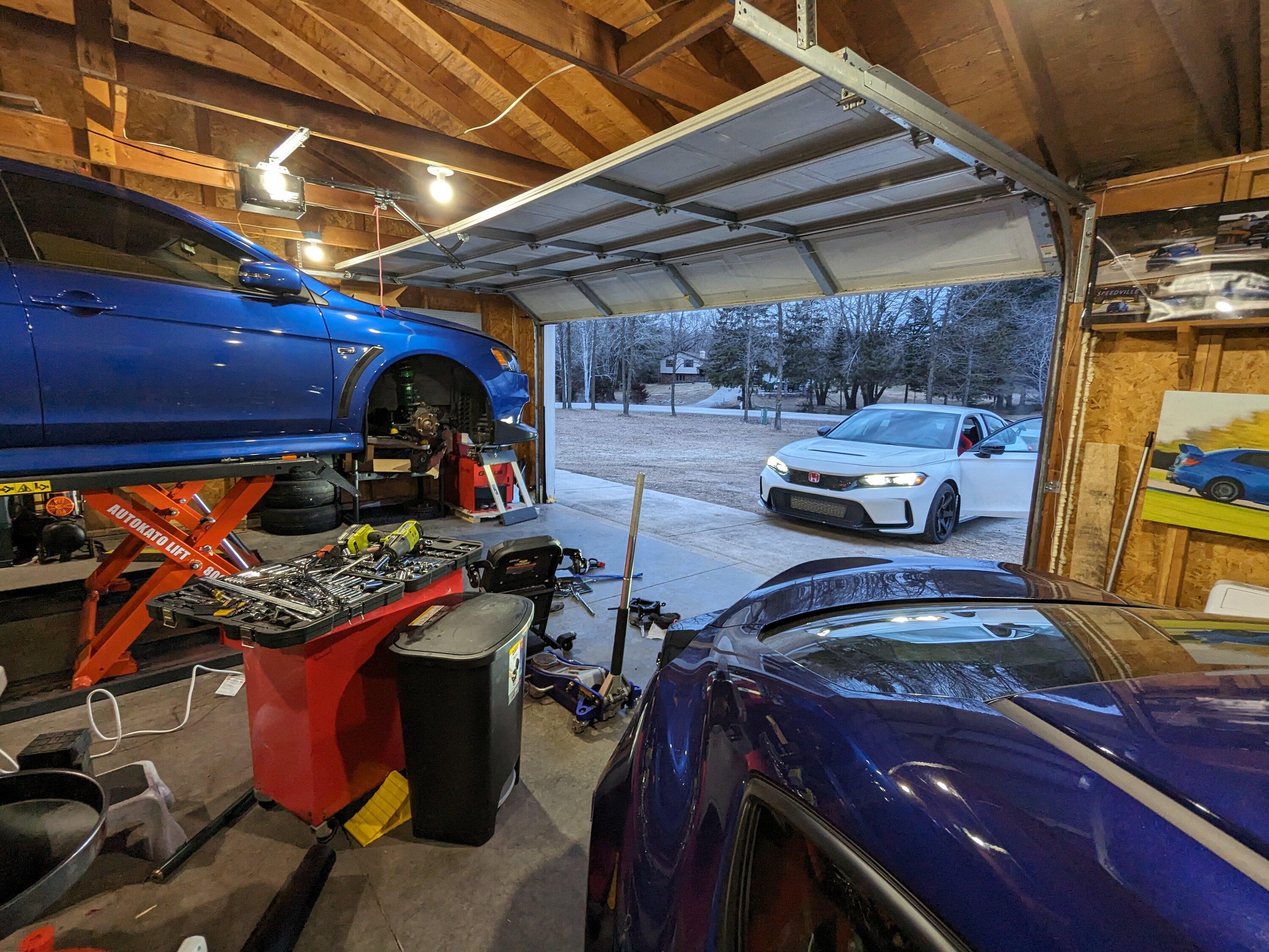 11th Gen Honda Civic What is your setup for raising the car up for service? 1000005364