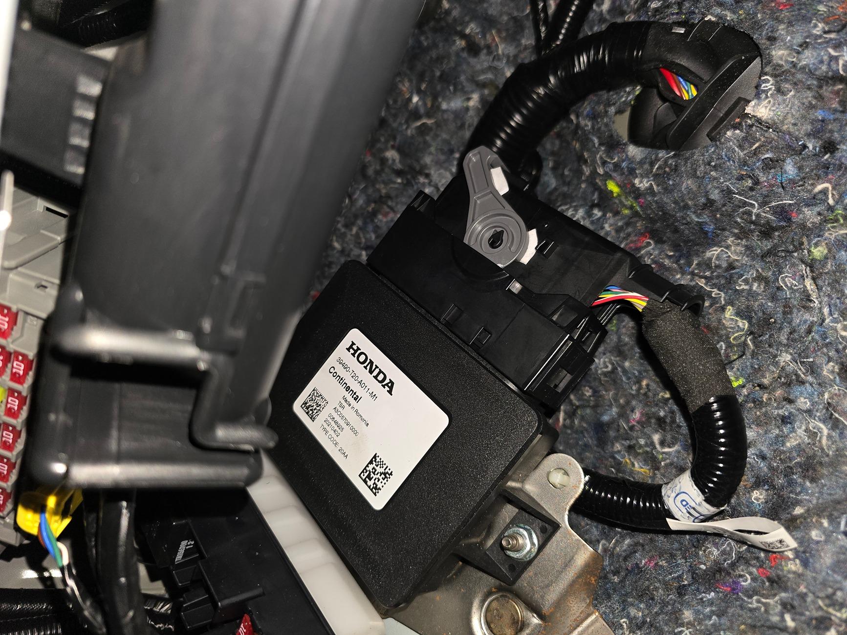 11th Gen Honda Civic Rattling near the parking brake control unit under the driver side 1000148956