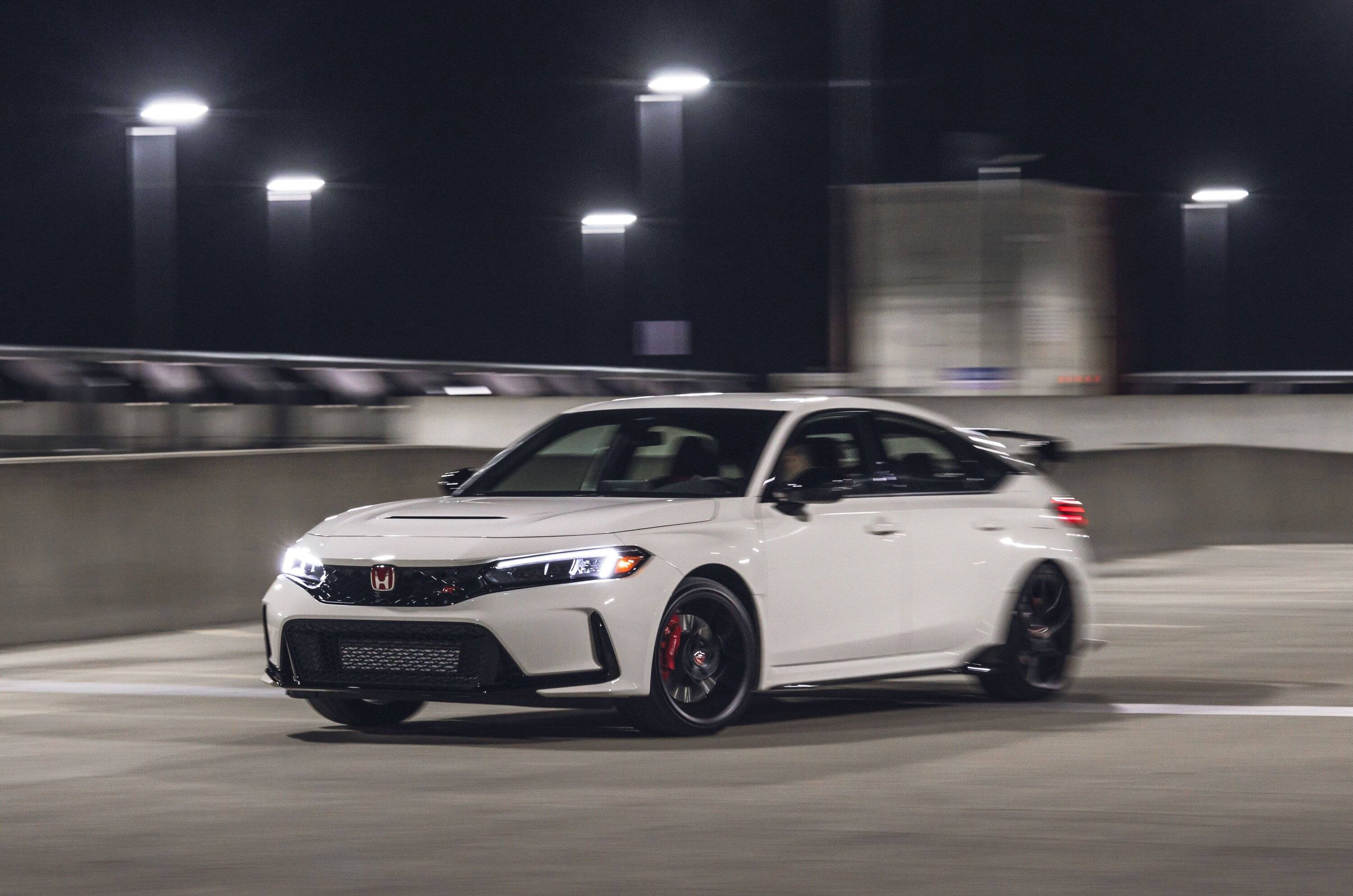 11th Gen Honda Civic Car and Driver Review: Slipping and Sliding in the 2023 Honda Civic Type R around a Wet Sonoma Raceway 2023-honda-civic-type-r-4129-1668454309
