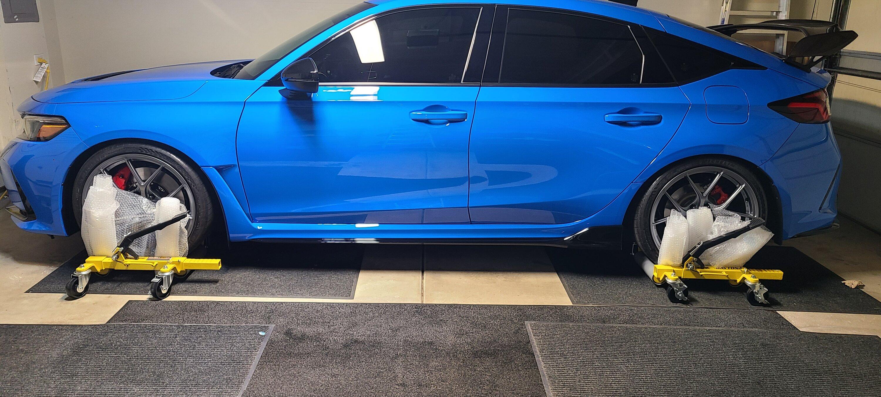 11th Gen Honda Civic Winter hibernation,the bubble wrap will be removed ..it sits about 3 inches off the ground bye until spring. 20231120_152836