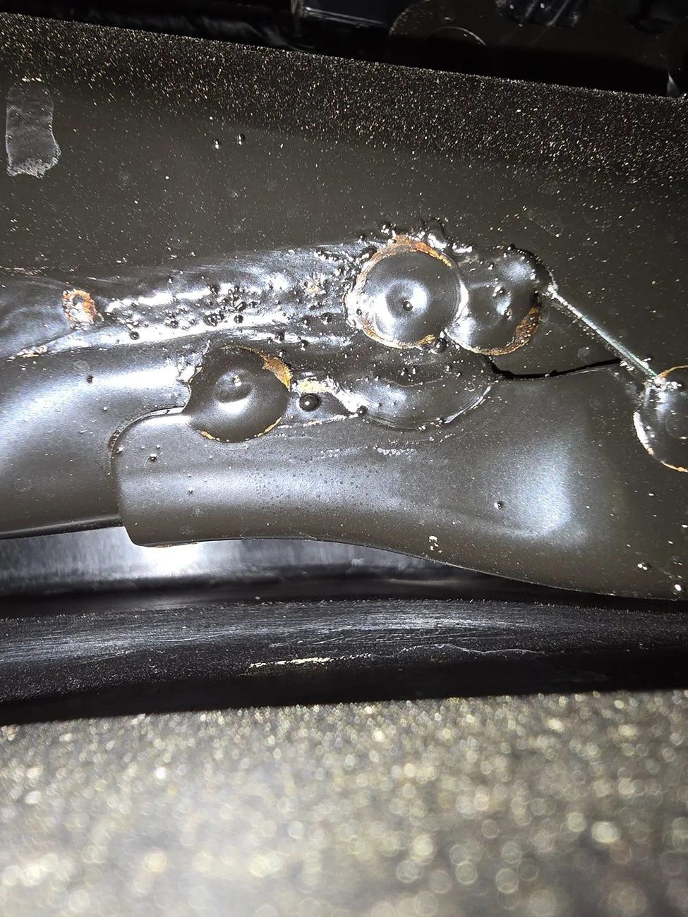 11th Gen Honda Civic Rust on frame welds and scuffs on metal 20250830_143857