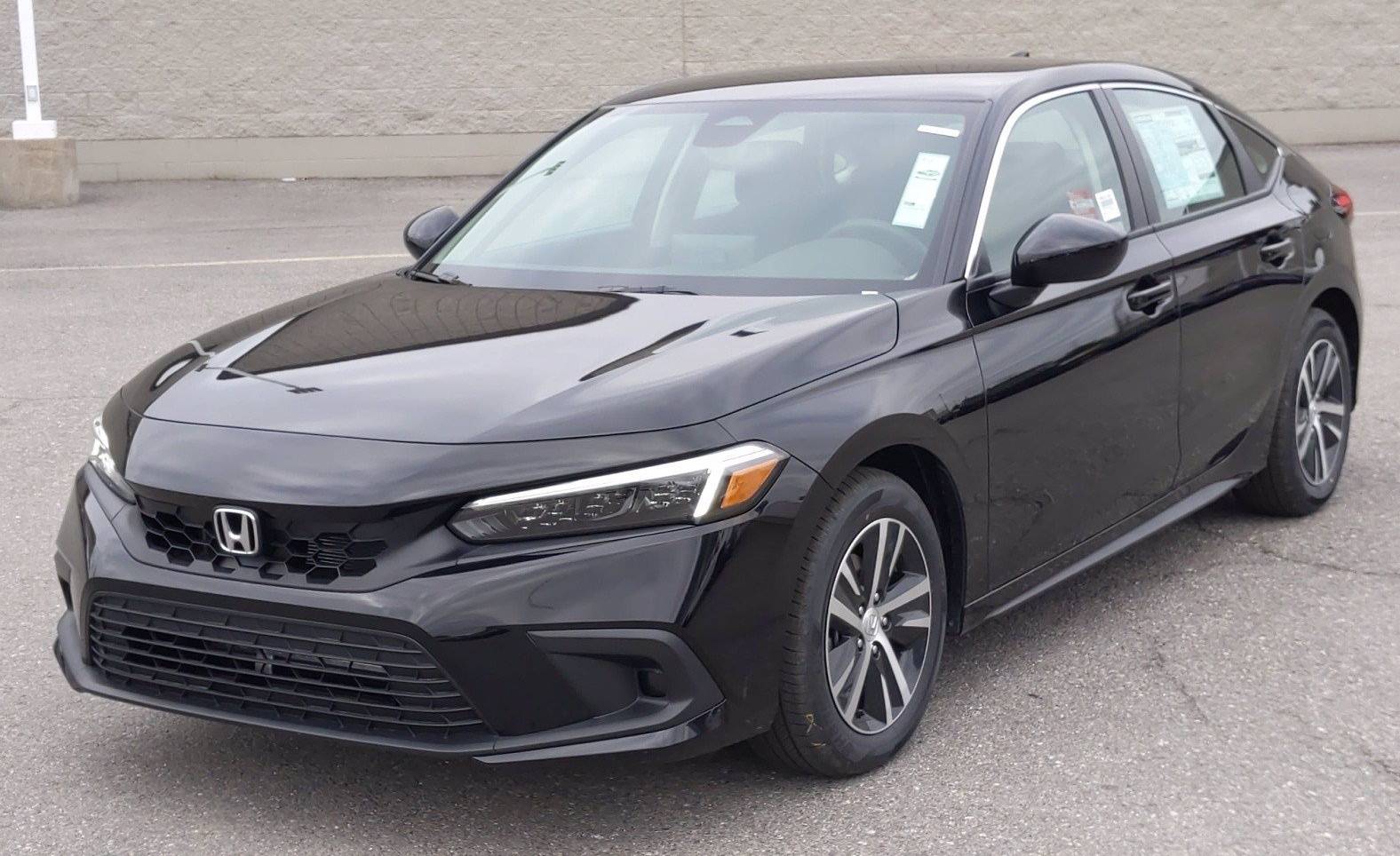 11th Gen Honda Civic Crystal Black hatchback 3b2e0749871c4a28a7451e647bafa3d4-01