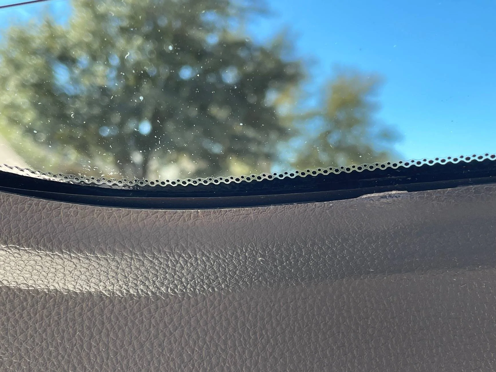 11th Gen Honda Civic Did my tint installer melt the hatch trim or do they all look like this? IMG_3103