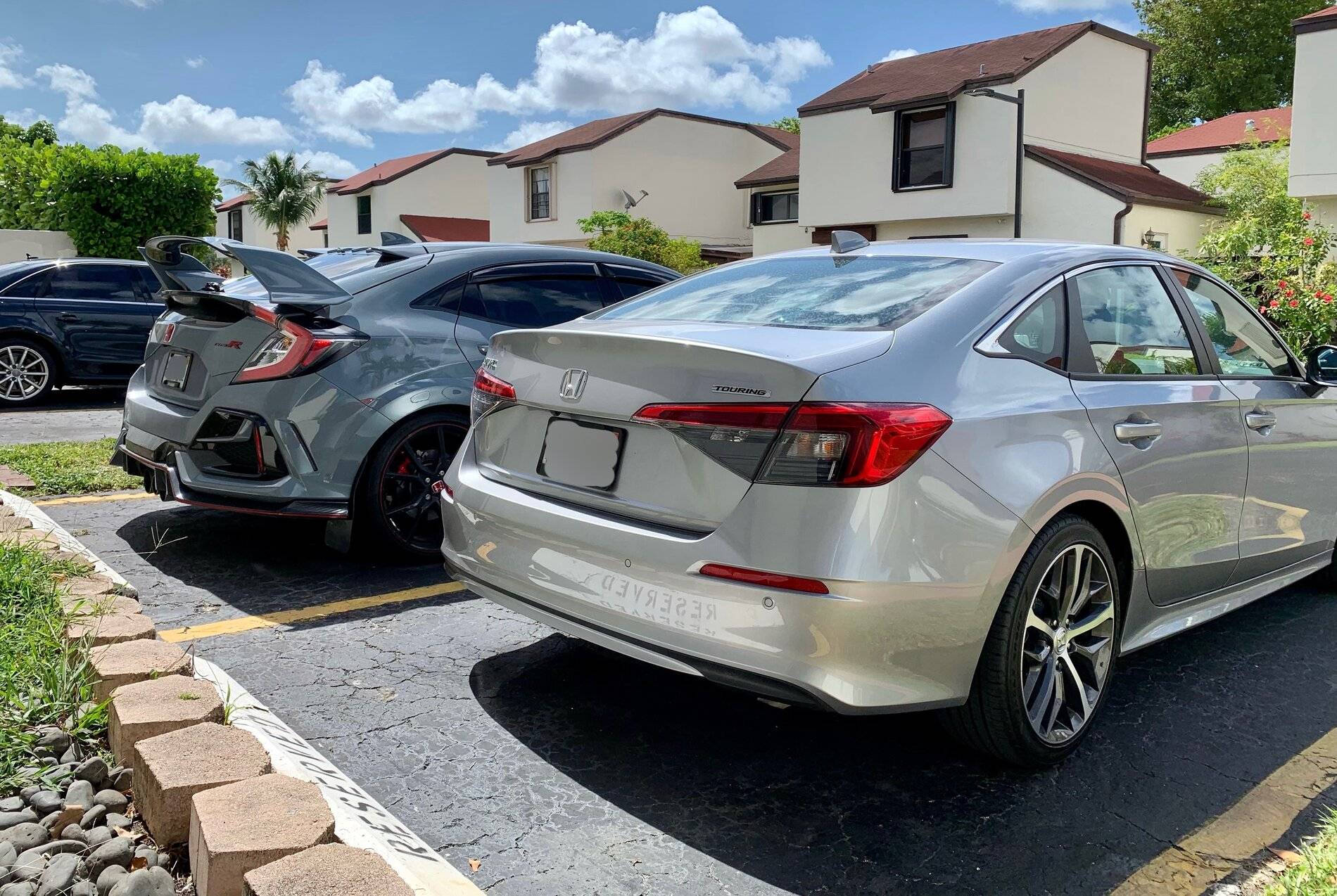 11th Gen Honda Civic 2022 Civic Touring sedan side-by-side with FK8 Type R LUNAR SILVER METALLIC 2022 Civic Sedan vs Civic Type R 3