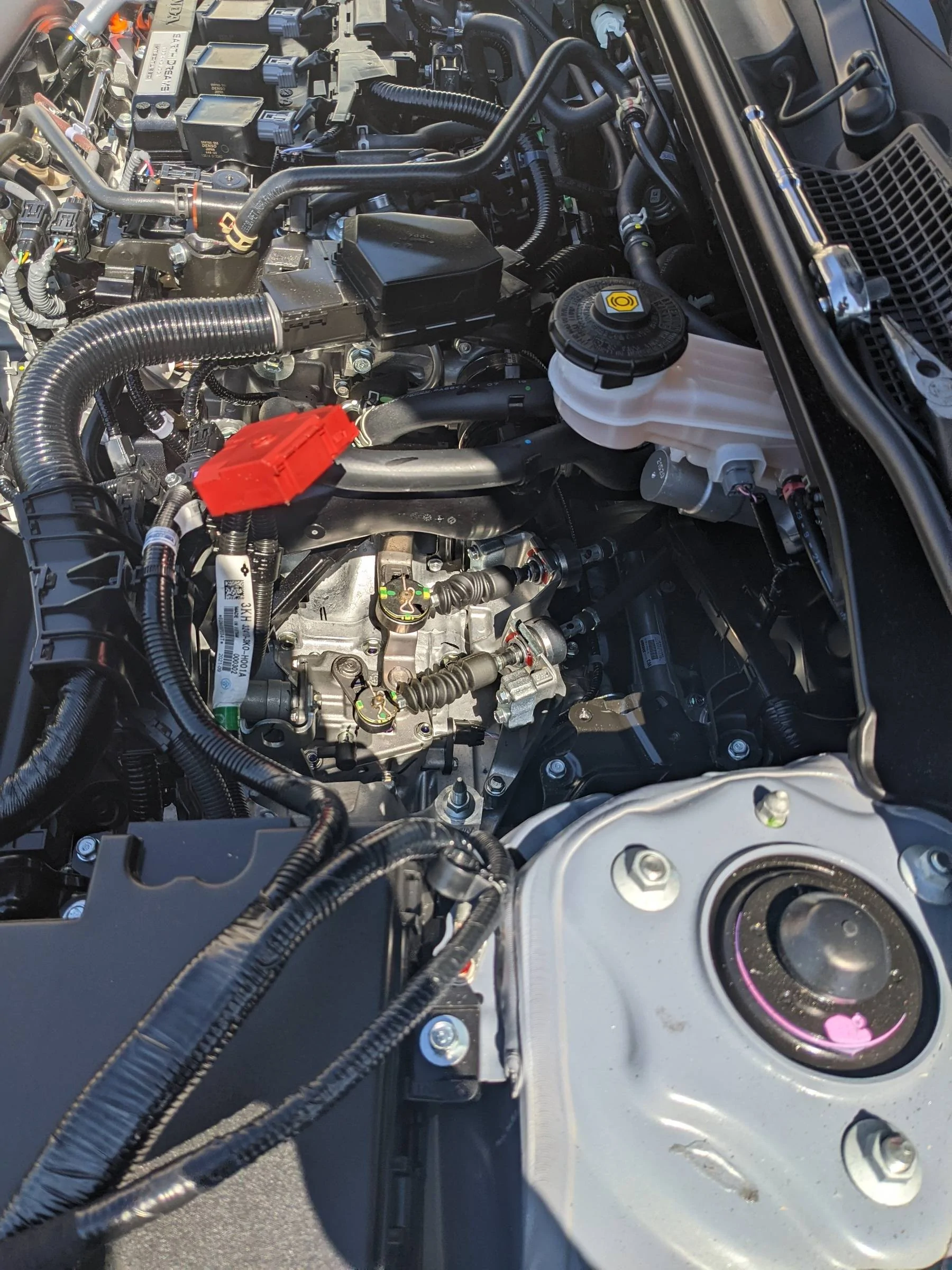 11th Gen Honda Civic Installed Acuity Instruments shifter cable bushings. mgJKBi