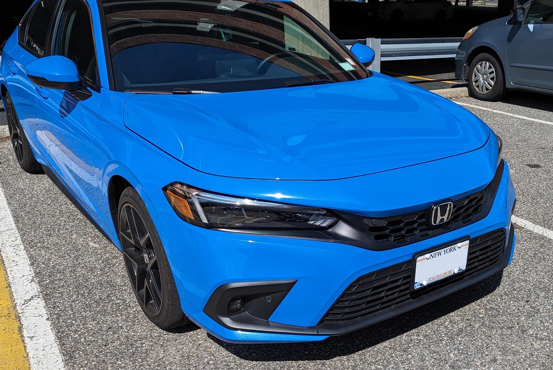 11th Gen Honda Civic 'JDM-style' Black emblems on Hatchback PXL_20240414_184729882