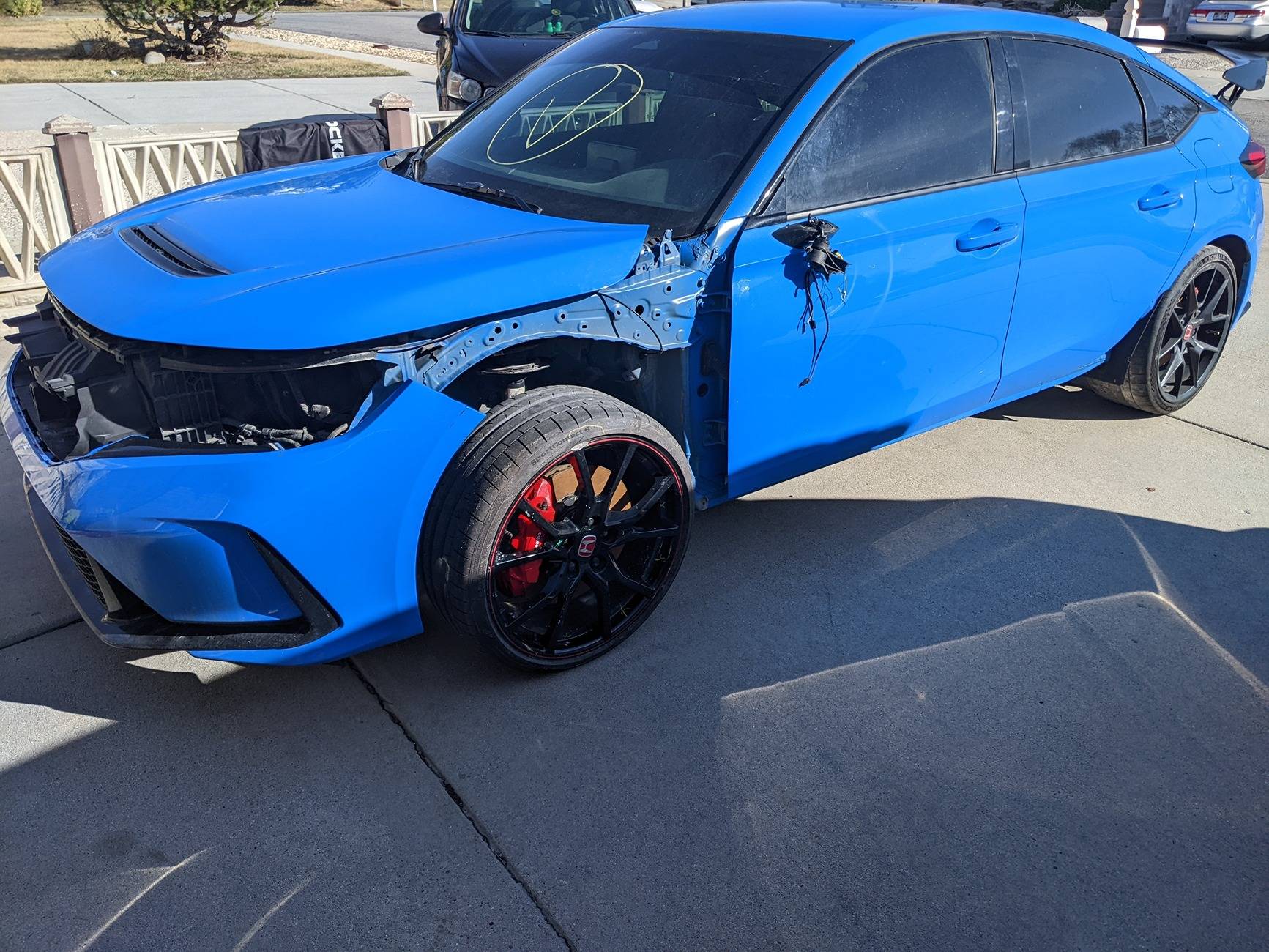 11th Gen Honda Civic Got carried away bidding at a salvage auction PXL_20250310_223837163