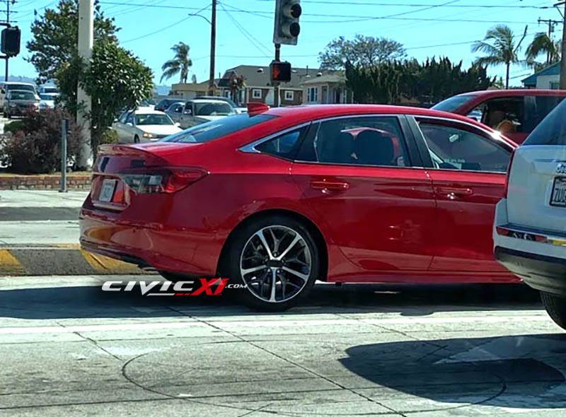 11th Gen Honda Civic 2022 Civic Sedan Aegean Blue Metallic Spotted in Honda HQ Parking Lot. Red 2022 Civic sedan