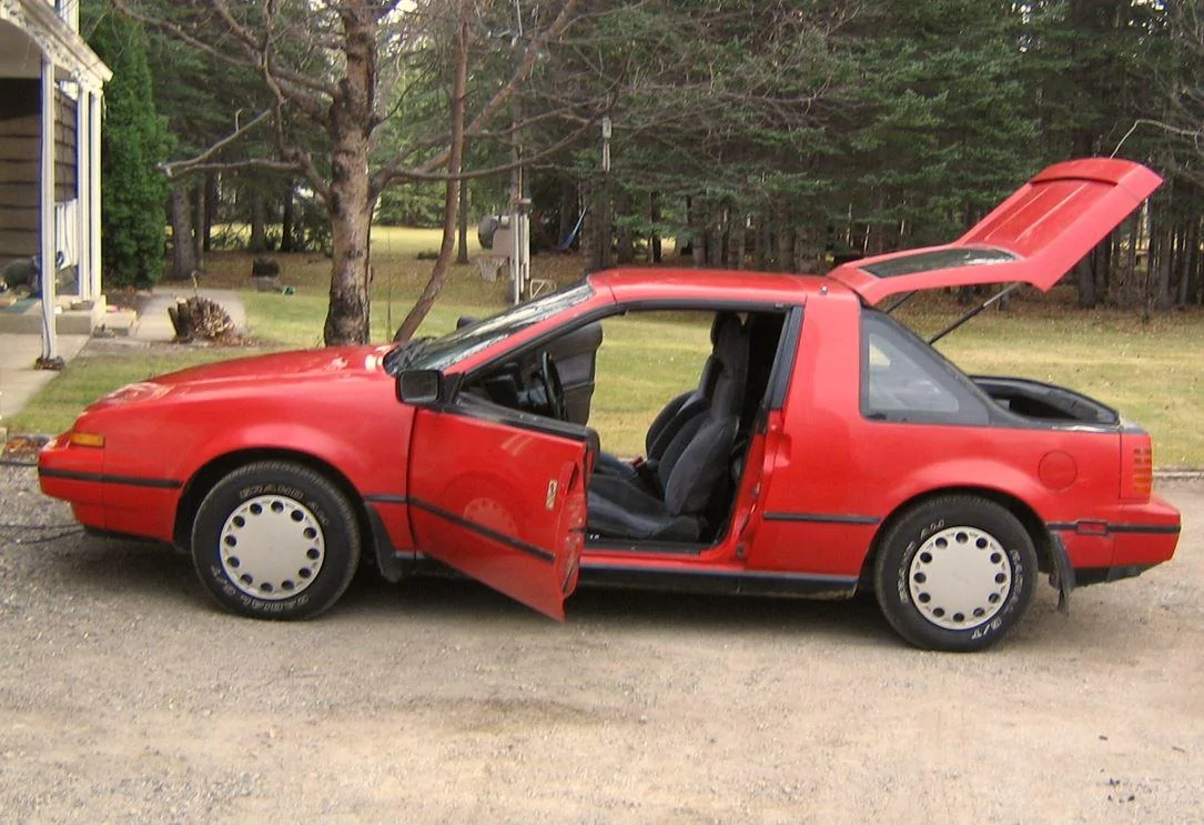 11th Gen Honda Civic I'm looking forward to the 2024 Civic Hybrid. How about you? red pulsar-hatch-u