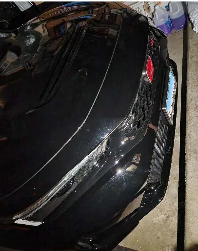 11th Gen Honda Civic Fraternal Twins Comparison: 2024 Integra Type S vs. 2023 Civic Type R -- Performance Tested tight-squeeze-front-plat