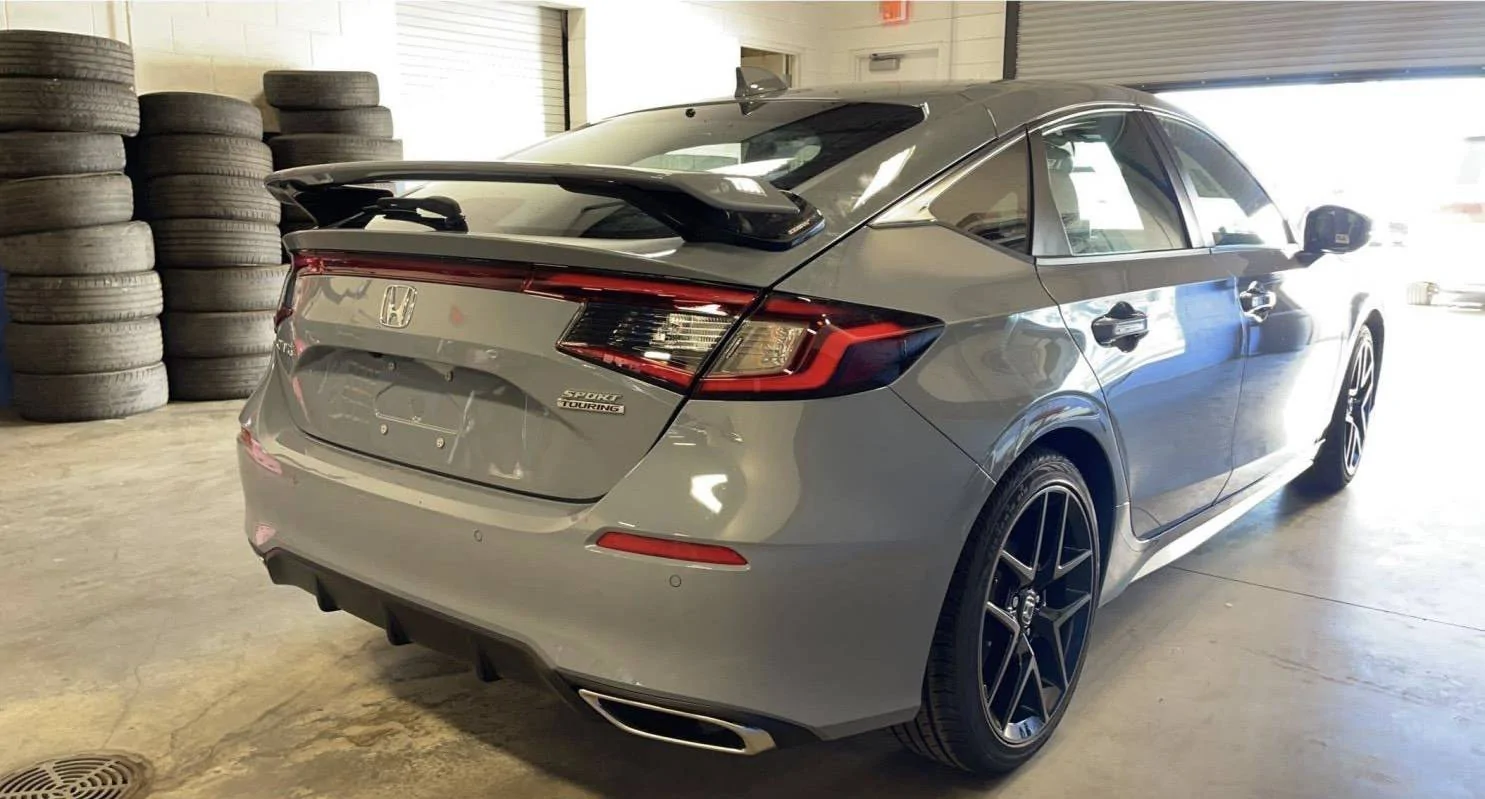 11th Gen Honda Civic Pre Pickup pics from my dealer, 22' Sport Touring hatchback, manual sonic gray with wing 2