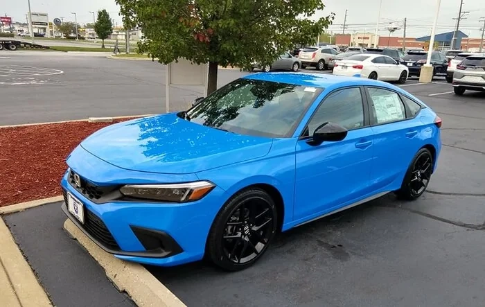 Test drove a Civic Hatchback Sport 2.0 Manual transmission Boost Blue Pearl - Excellent vehicle, but outrageous dealer markup!