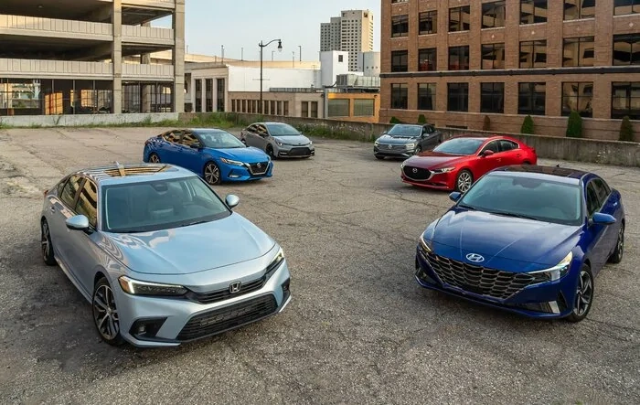 2022 Civic Touring Sedan beats out 5 rivals : Mazda 3, Jetta, Elantra, Sentra, Corolla [Car and Driver Competition]